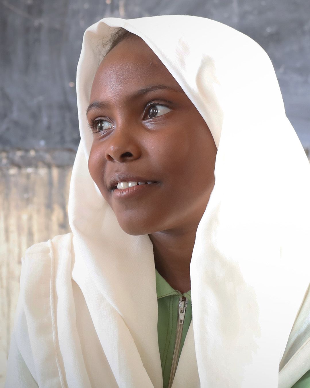 Midwife Razia carries out a checkup on Maimuna* (4 months) in a health centre, Bangladesh