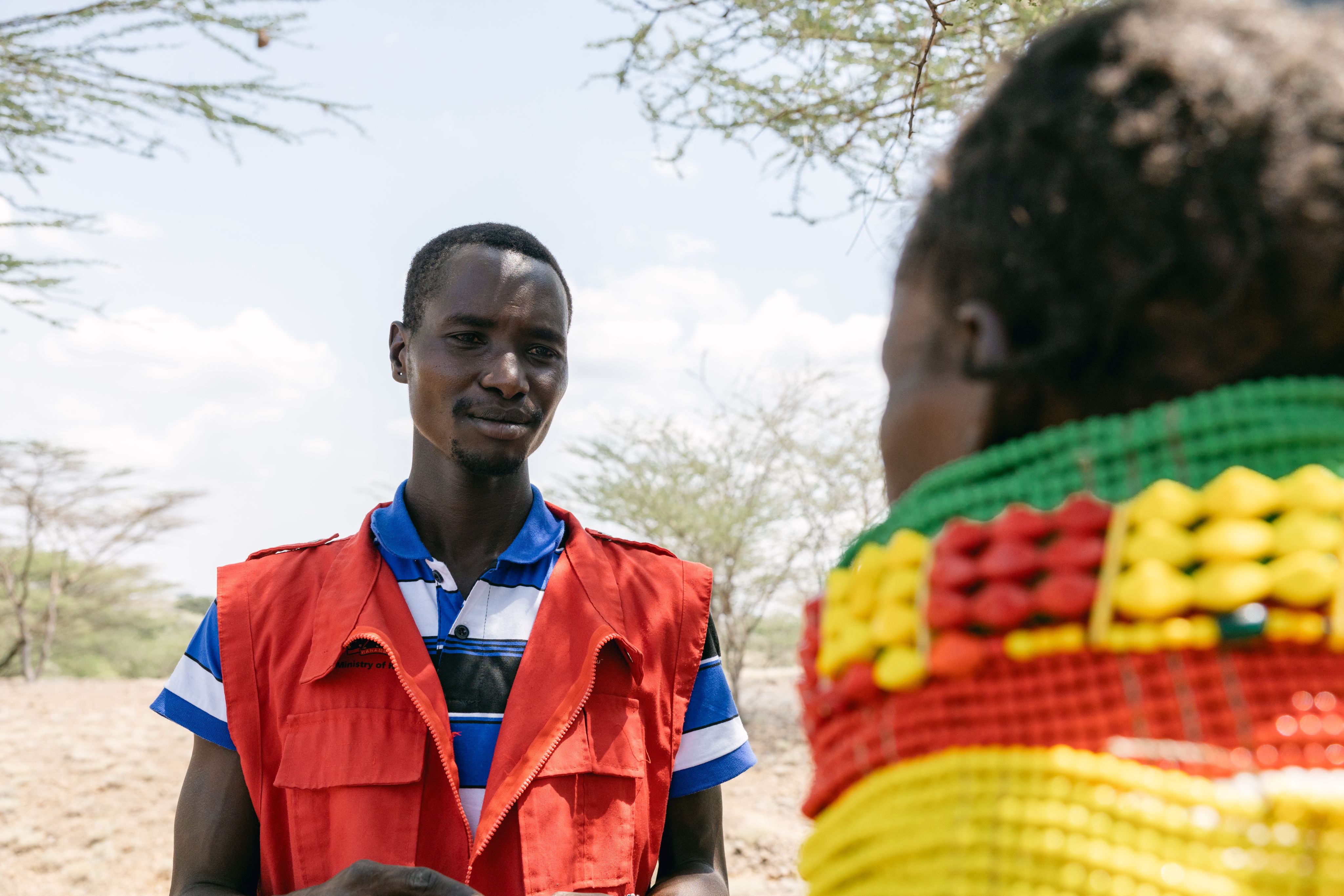 Charles talking to Ereng's mother