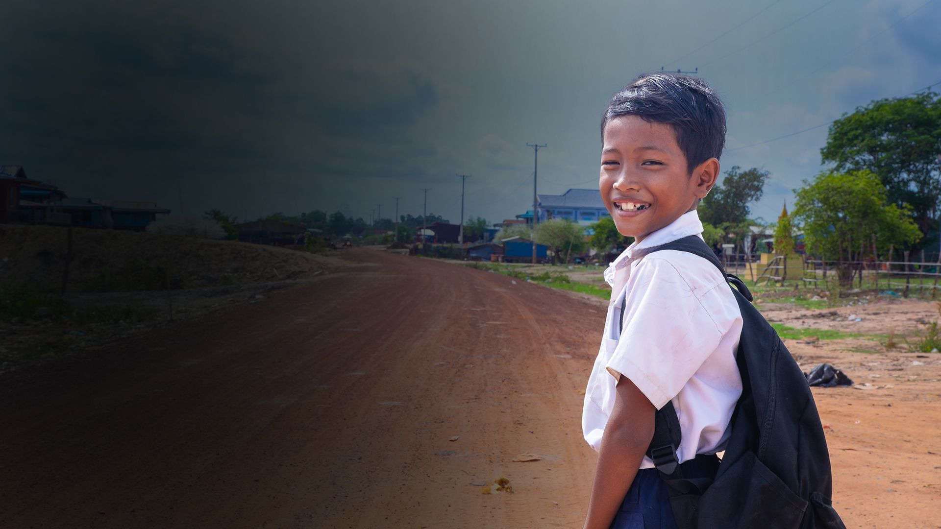 Polin, 10 walking to his newly renovated school, Cambodia