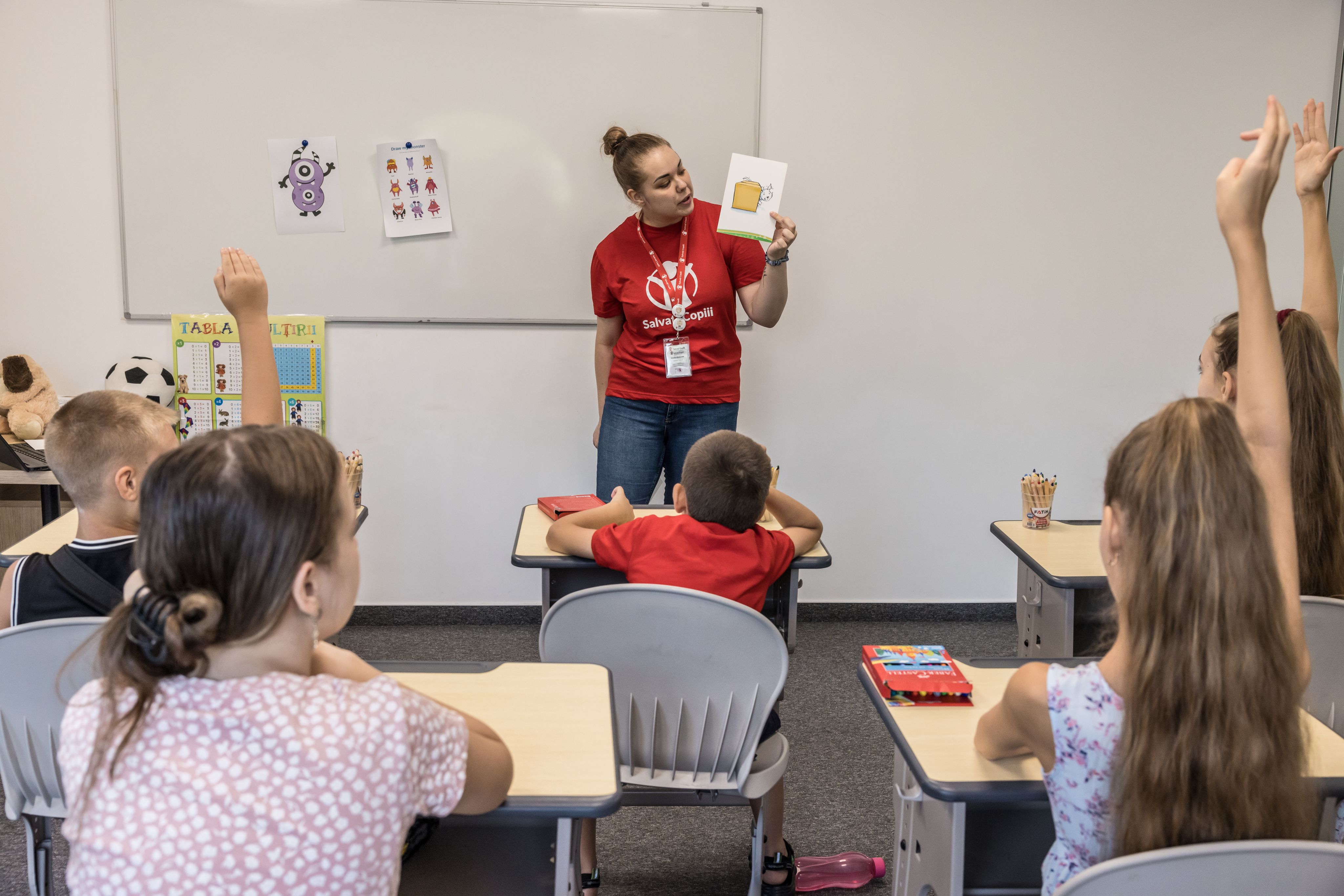 Mariia, Save the Children staff, teaching English at a hub for Ukrainian children, Bucharest, Romania