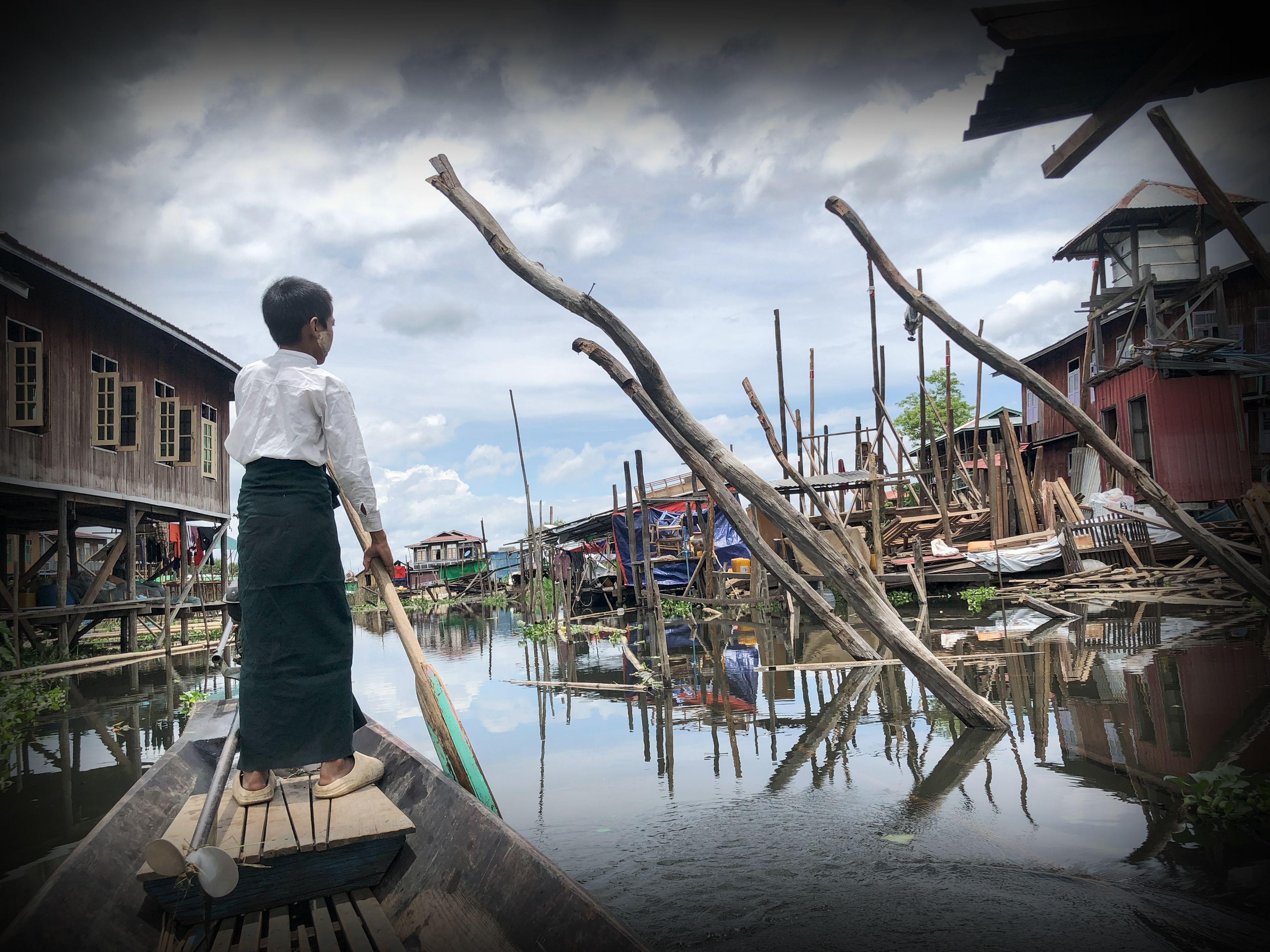 Child, 12, rowing through disaster scene