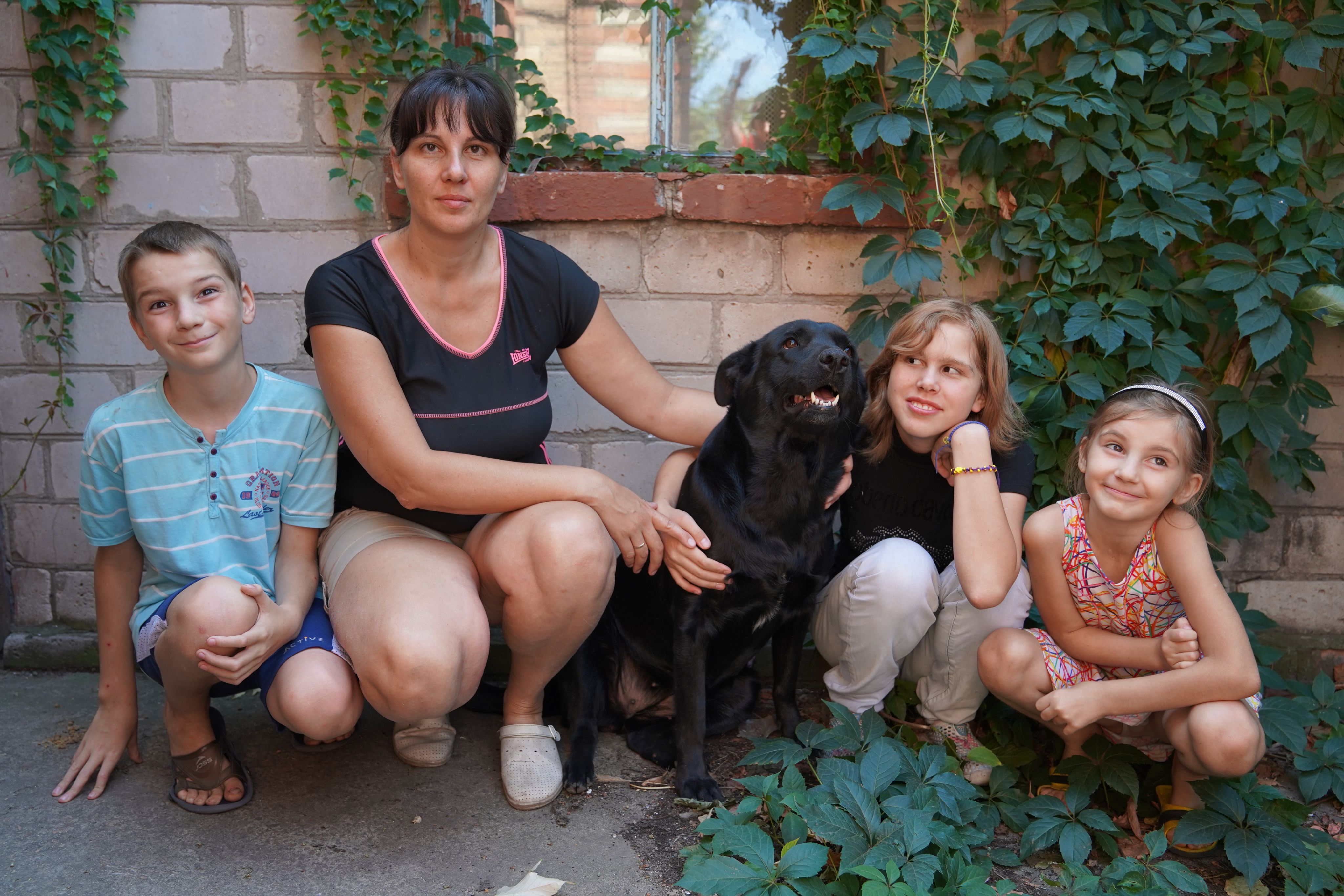 Mariia*, 42, who lives in Zaporizhzhia, Ukraine with her three children and their dog Sherry. 